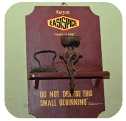 A hand grinder and cast-iron clothes iron — relics of Easispice's early days
